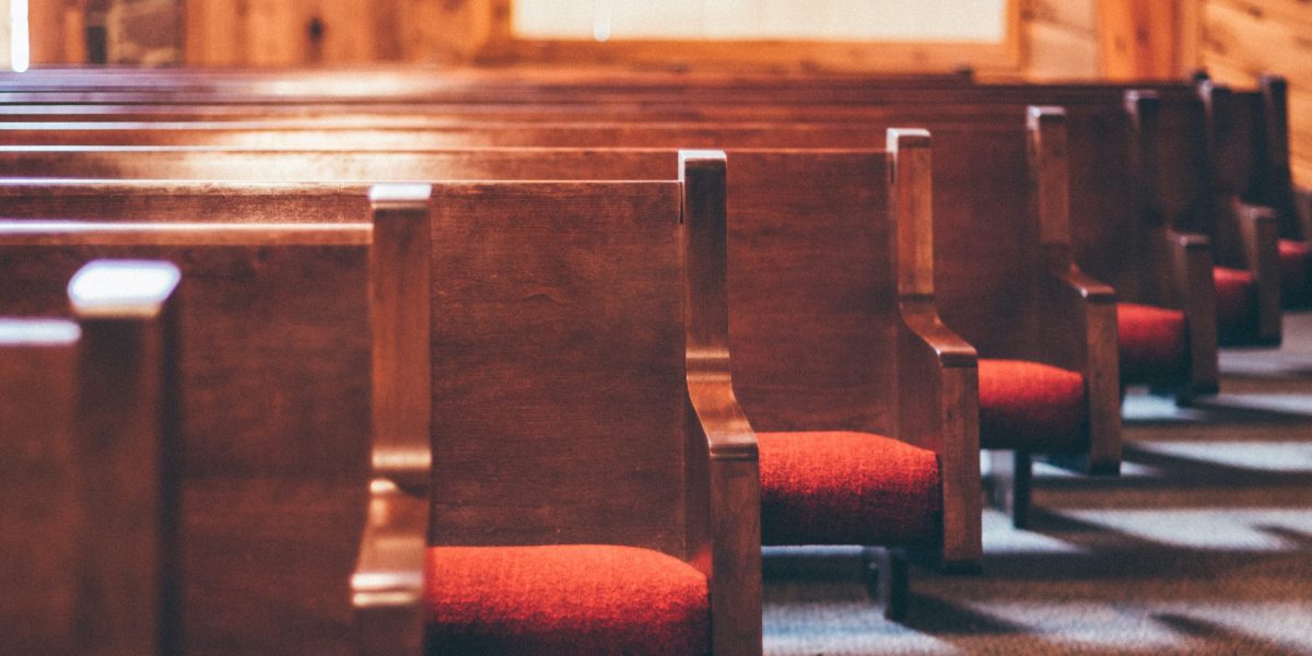 lined brown pew benches