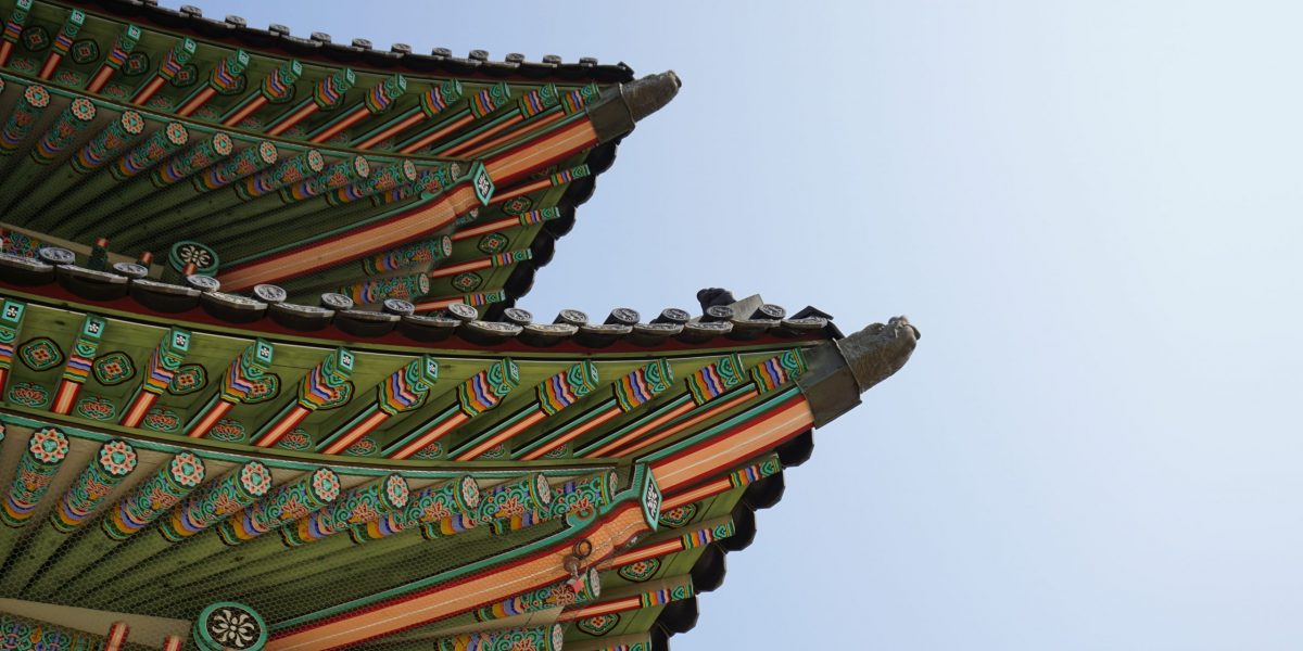 green and black pagoda roof